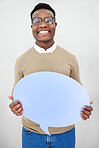 Portrait, man and speech bubble with smile and mock up space in studio for opinion or voice on white background. Face, person and paper poster for social media news, vote or review with happiness