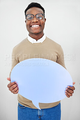 Buy stock photo Portrait, man and speech bubble with smile and mock up space in studio for opinion or voice on white background. Face, person and paper poster for social media news, vote or review with happiness