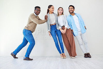 Buy stock photo Team building, together and support with trust in space for international partnership, synergy and unity. Businesspeople, man and woman for smile, face and vision of diversity, strength and corporate