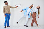 Megaphone, announcement and people in studio to listen to a broadcast message on a gray background. Loud, sound and noise for the communication of a news alert or notification with a bullhorn