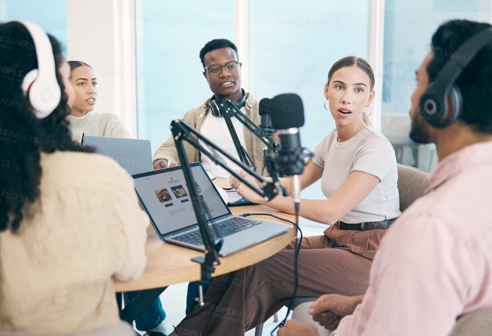 Buy stock photo Conversation, podcast speaker and group of people, team or presenter communication, streaming and hosting talk show. Radio multimedia production, diversity and influencer listening on media network