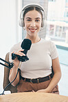 Portrait, podcast and woman with a microphone, live streaming and smile with news broadcasting. Face, happy person and radio presenter with tech, headphones and public relations with content creator