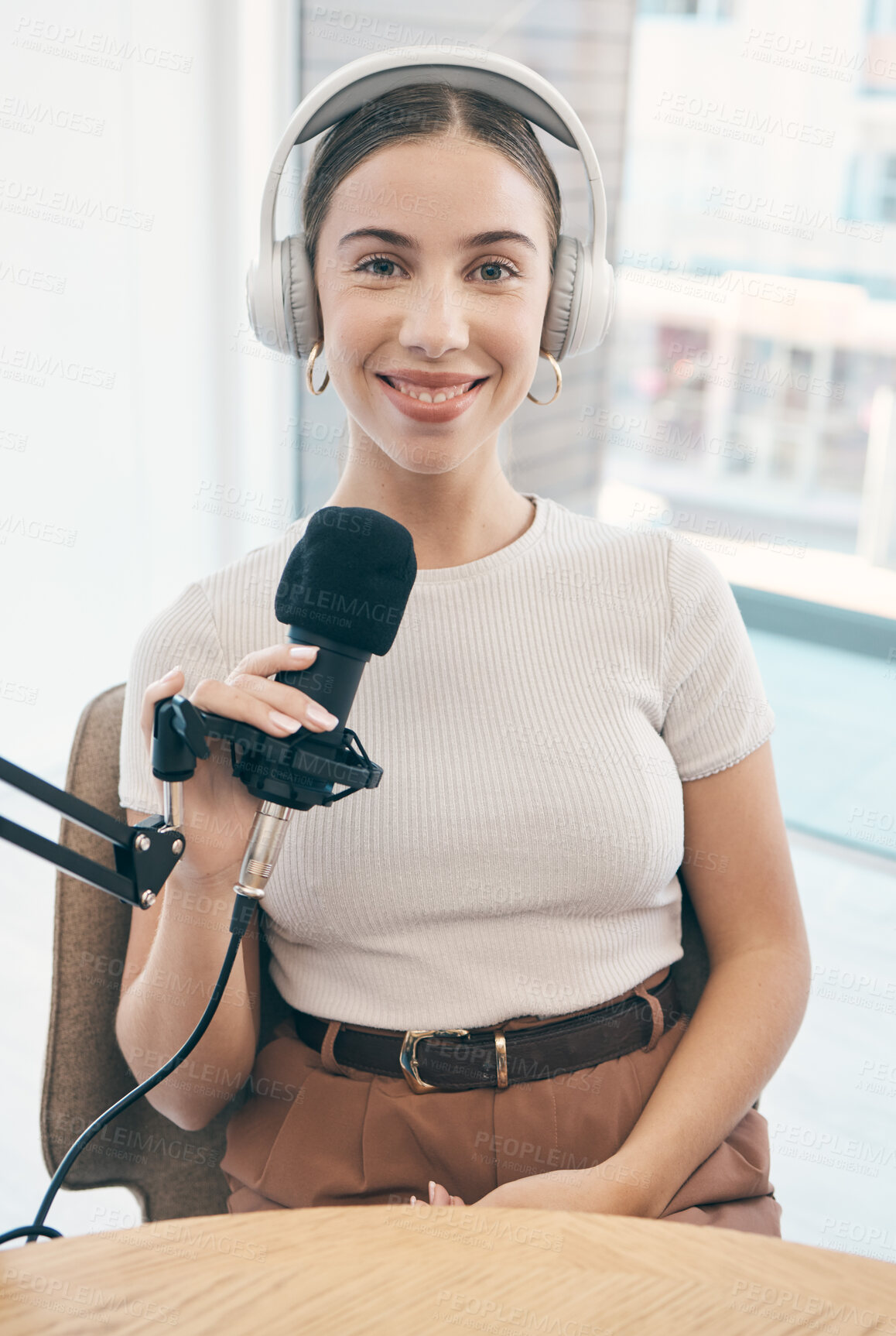 Buy stock photo Portrait, podcast and woman with a microphone, live streaming and smile with news broadcasting. Face, happy person and radio presenter with tech, headphones and public relations with content creator