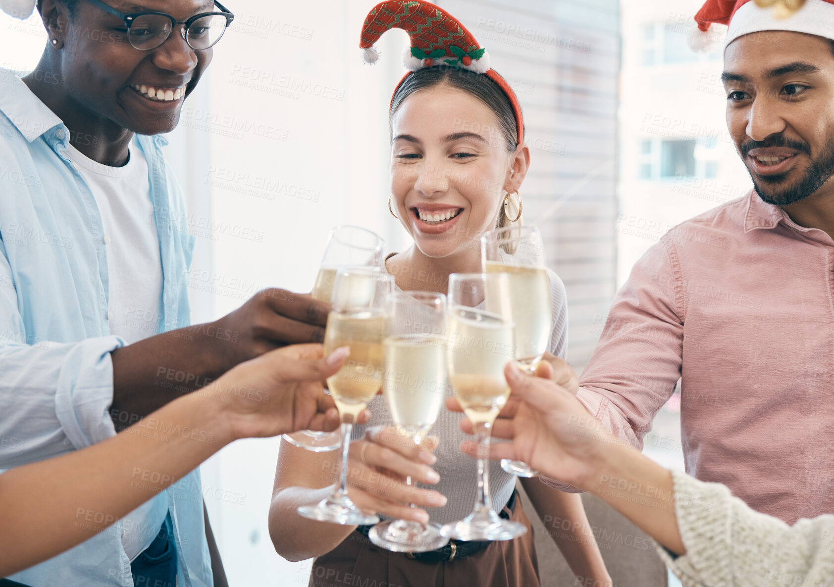 Buy stock photo Champagne, Christmas party and toast with group of people at office, celebration and fun with holiday and alcohol. Wine, cheers and employees at work event for Xmas, happy and diversity with drinks