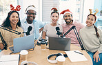 Christmas, podcast team and portrait of people in office for holiday, festive event or celebration. Collaboration, live streaming and happy men and women with mic, laptop and tech for radio broadcast