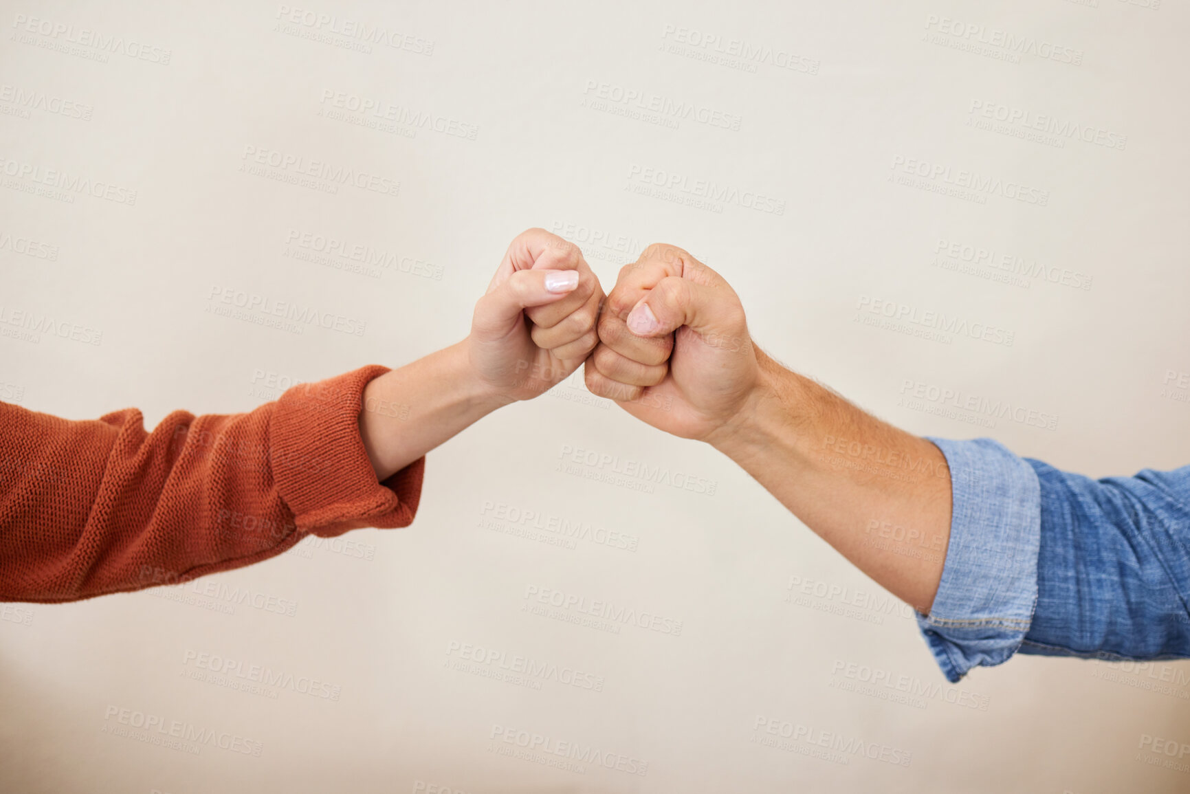 Buy stock photo Fist bump, partnership and hands, people in a team with support, celebration and hello, success and solidarity. Synergy, cooperation and trust, agreement and deal with handshake and wall background