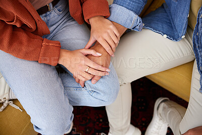 Buy stock photo Couple, holding hands and closeup on sofa, home and care with love, bonding and kindness in relationship. Above people, together and support with empathy, trust and respect with solidarity in house