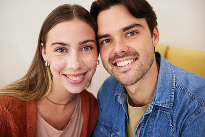 Buy stock photo Portrait, couple or smile with love, care and bonding on sofa in living room of home or apartment. People, man or woman with happiness, romance and support on couch in lounge of house for commitment