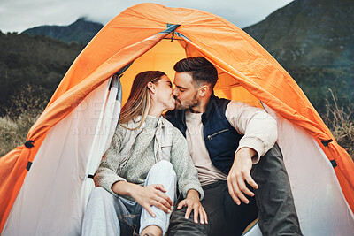 Buy stock photo Couple, kiss and tent in camping on mountain for love, care or affection in nature together. Woman kissing man on camp site for romantic getaway, holiday vacation or weekend in outdoor bonding