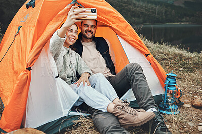 Buy stock photo Couple, tent and camping selfie with smile, memory and holiday, web blog and morning in countryside. Man, woman and relax with vacation, social media post and adventure with love, outdoor and freedom