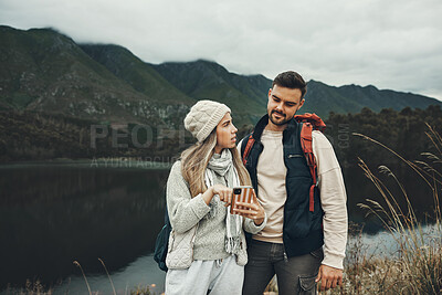 Buy stock photo Couple, phone and hiking by lake or nature with online search for direction, guide or map on carbon footprint journey, Confused people lost in mountains with backpack, travel and check for location