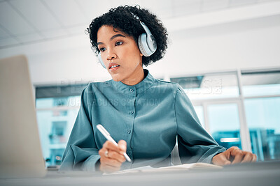 Buy stock photo Headphones, computer and woman writing notes in office doing research for creative project. Notebook, technology and professional female designer working, planning and listen to music in workplace.