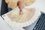 Person, hand and money fan in financial freedom, salary or payment for investment, growth or profit at office. Closeup of employee with cash flow, paper note or bills in expenses, savings or shopping