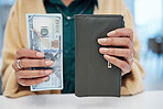 Person, hands and wallet with money for investment, payment or savings on counter at checkout. Closeup of employee with cash, bill or paper notes for profit, salary or finance in purchase or shopping