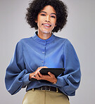 Happy, portrait and business woman with tablet in studio for internet, search or planning on grey background. Digital, web and face of female entrepreneur with app for sign up, email or subscription