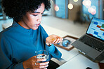 Pills, water and business woman with medicine in office for wellness, health and vitamins at desk. Healthcare, corporate and worker with tablets and glass for supplement, medication and prescription