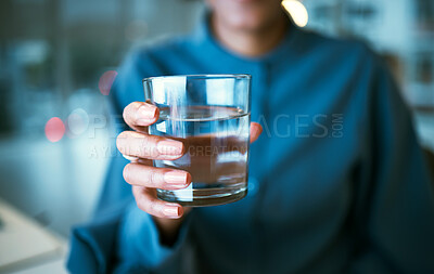 Buy stock photo Water, glass and hand closeup in office, woman and giving for hydration, wellness or choice at finance company. Accountant, natural drink and zoom for nutrition, diet or detox for health in workplace