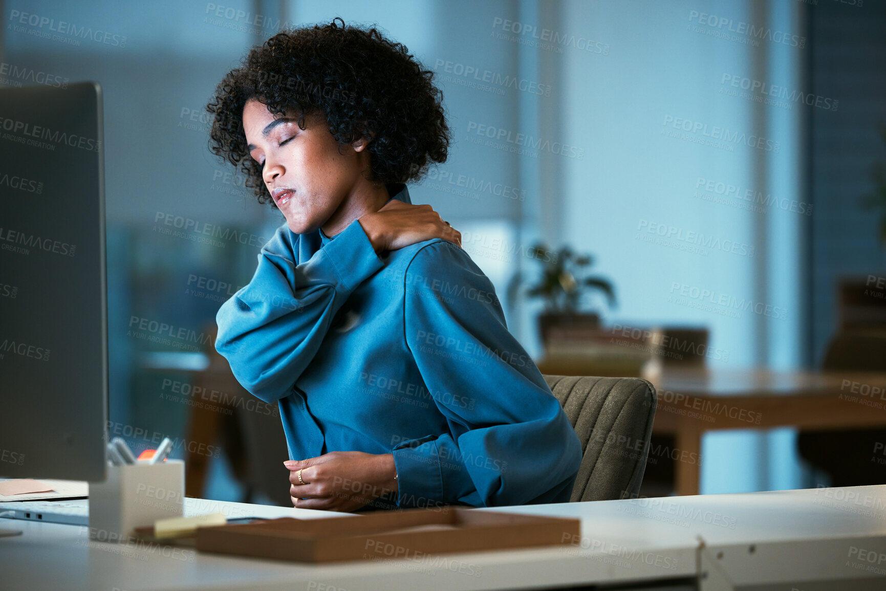 Buy stock photo Back pain, night and business woman tired of overtime, deadline and work pressure with burnout and muscle strain. Corporate, evening and employee with stress injury working late in a company