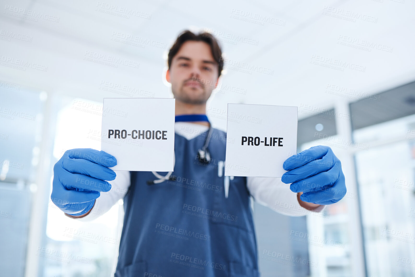 Buy stock photo Life, choice and doctor with paper in hands for abortion, human rights or decision in clinic. Nurse, poster and support for women with option of family planning in hospital or medical contraception