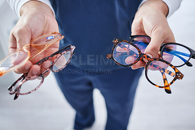 Buy stock photo Optometry, glasses and hands of person with option for frame, prescription lens and spectacles for sight. Healthcare, ophthalmology and optician with decision for eye care, vision and medical clinic