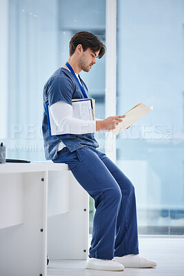 Buy stock photo Medical folder, doctor and man reading health results, healthcare records or clinic compliance policy. Services, medicine research and profile of nurse, surgeon or expert check paperwork portfolio