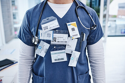 Buy stock photo Hospital, doctor and man with name tag, healthcare and promotion with progress, surgeon and nurse. Zoom, person and medical professional with card, wellness and consultant with physician in a clinic