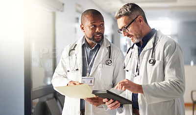 Buy stock photo Teamwork, tablet or mature doctors talking for advice in healthcare discussion for file documents. Senior surgeons, help or men speaking of collaboration for medical research in hospital clinic