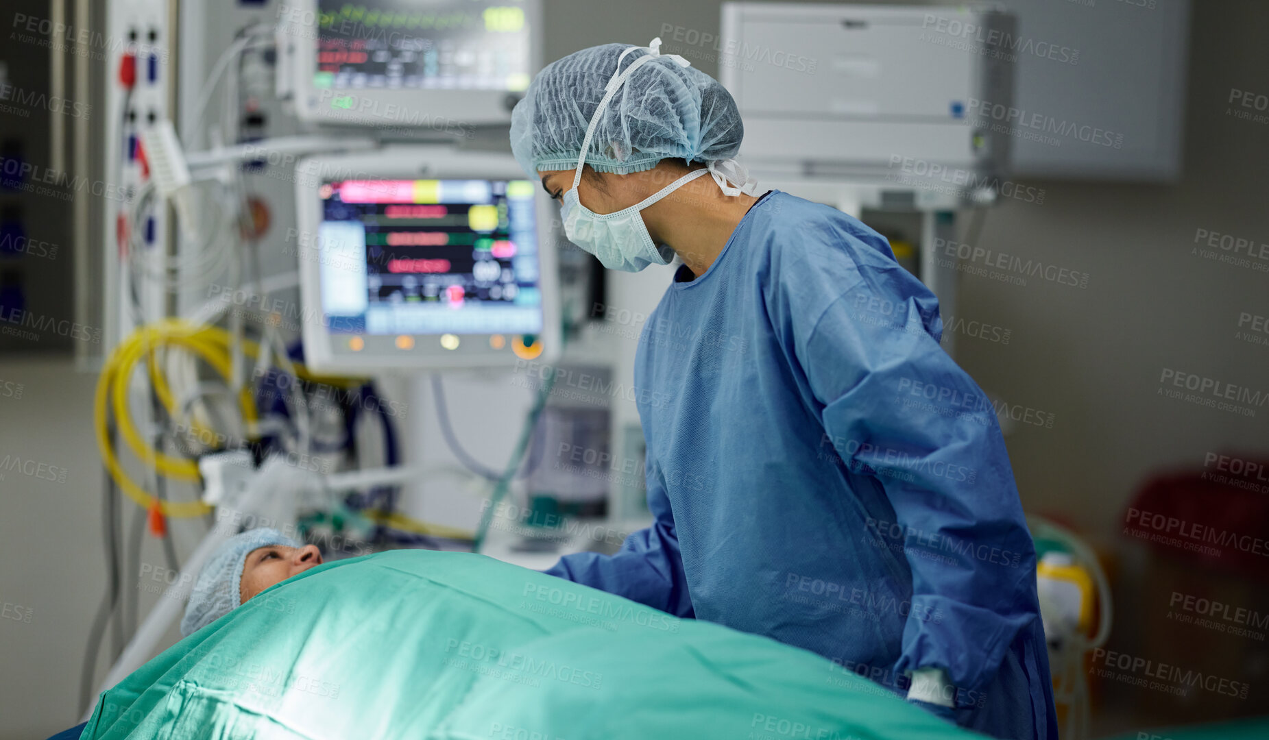 Buy stock photo Bed, theatre or doctor with patient in surgery procedure or healthcare operation in hospital clinic. Accident injury, people or surgeon in face mask helping in operating room in medical at night