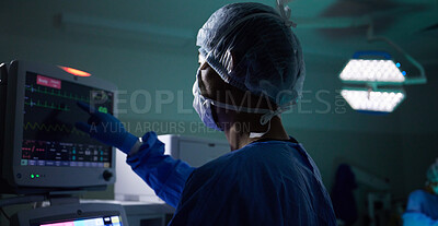 Buy stock photo Back, medical and monitor with a doctor in theater for surgery or a healthcare procedure at the hospital. Medicine, technology and equipment with a professional surgeon in a clinic for an operation