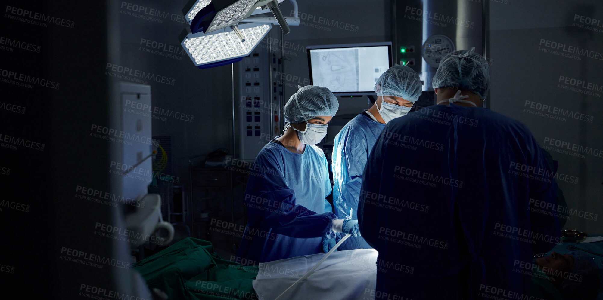 Buy stock photo Surgery, dark room and doctors with healthcare, teamwork and support with wellness, safety and emergency. People, medical professionals or group with cooperation, theatre and medicine in hospital