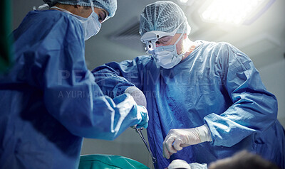 Buy stock photo Healthcare, teamwork and doctors in a hospital for surgery together, working in theater to save a life. Medical, emergency and a surgeon team in the operating room of a clinic for an operation