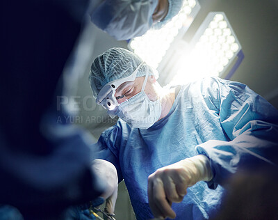 Buy stock photo Healthcare, teamwork and doctors in theater for surgery together, working in a clinic to save a life. Medical, emergency and a surgeon team in the operating room of a hospital for an operation
