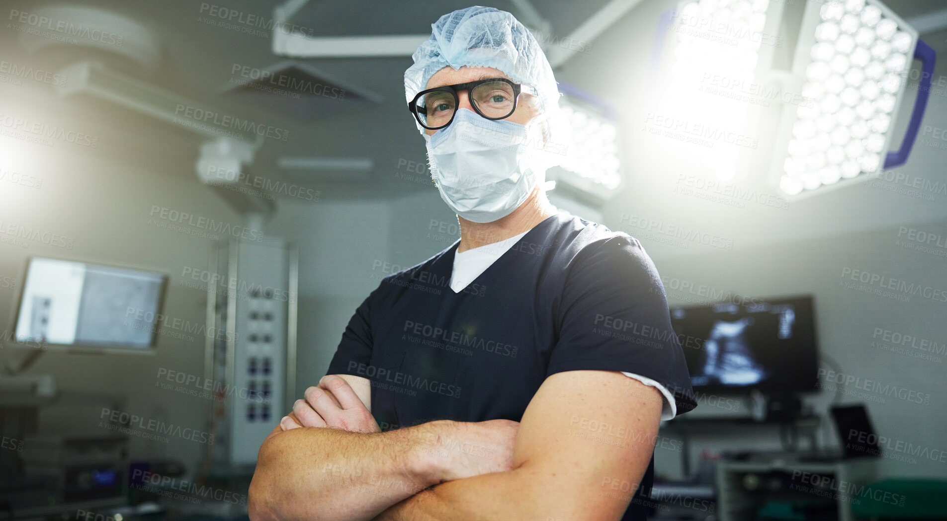 Buy stock photo Man, portrait and surgery in operating room confident healthcare, professional or expert help. Male person, face mask or hospital theatre lights or medicine support, doctor or emergency care service