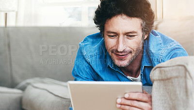 Buy stock photo Man, relax and tablet internet on couch for digital contact, social media or movie app. Male person, streaming film and online shop connection or connectivity fun for comfort, weekend joy on sofa