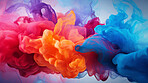 Colorful vibrant rainbow, ink in water background.