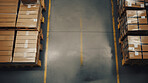 Top-down view: Warehouse with cardboard boxes. Products in distribution center ready for global shipment