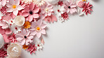 Paper flower decor in corner of background. Abstract copy space concept.