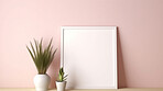 Canvas mockup against pink wall. Empty canvas on table top for your design.