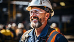 Portrait of a man, happy oil rig worker in industrial plant.