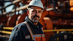 Portrait of man, oil rig engineer in industrial plant.