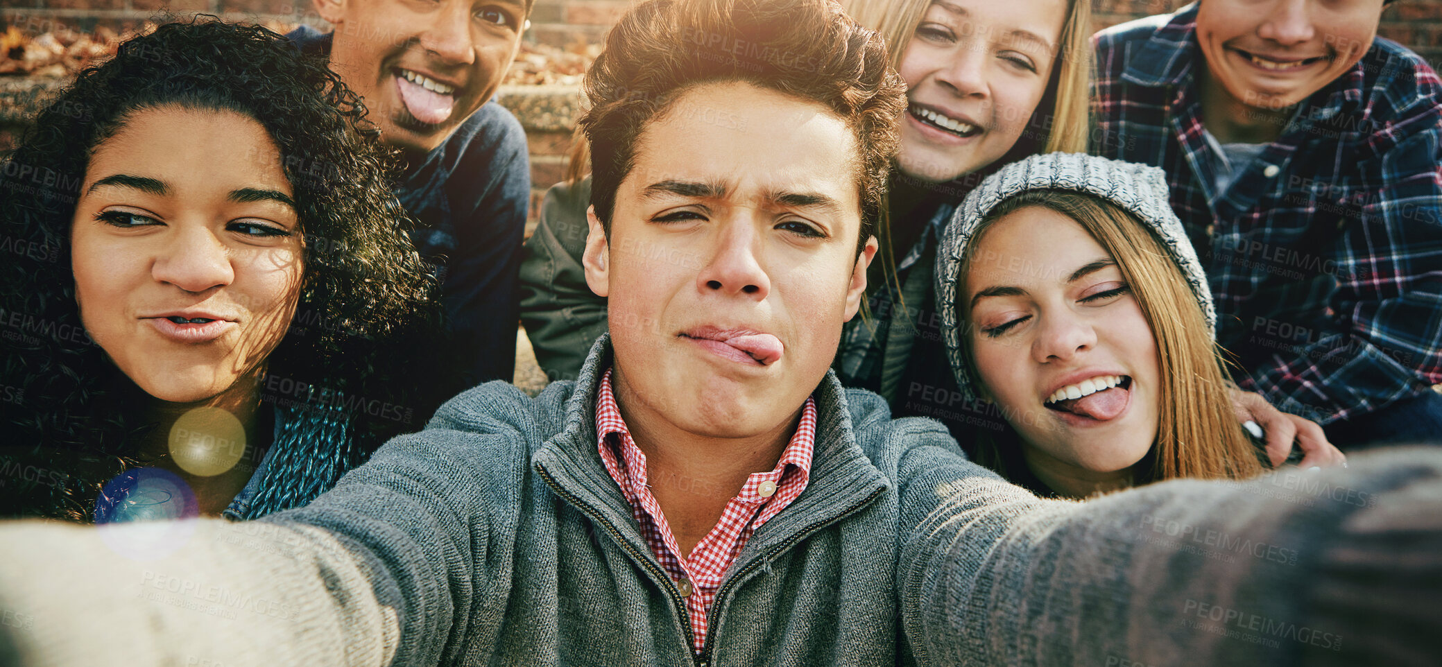 Buy stock photo Teenage, friends or group selfie in autumn or social media joy, diversity or outdoor community bonding. Girls, male person or portrait fun face memory in park joy picture, clothes or profile picture