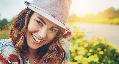 Buy stock photo Portrait of an attractive young woman enjoying a spring day outdoors