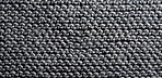 Close-up of grey texture fabric. Wool textile background.