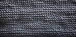 Close-up of grey texture fabric. Wool textile background.