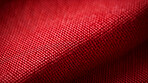 Close-up of red texture fabric cloth textile background.