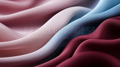 Close-up of folded, mixed colour texture fabric. Cloth textile background.