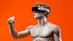 Sculpture or statue of David wearing a VR headset on an orange background