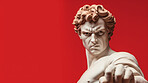 Sculpture or statue of David with angry or annoyed expression on red background