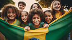 Group of diverse kids holding a flag. Educate and celebrate different nationalities and countries