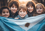 Group of diverse kids holding a flag. Educate and celebrate different nationalities and countries